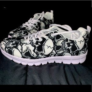 White sneakers with black skull print!